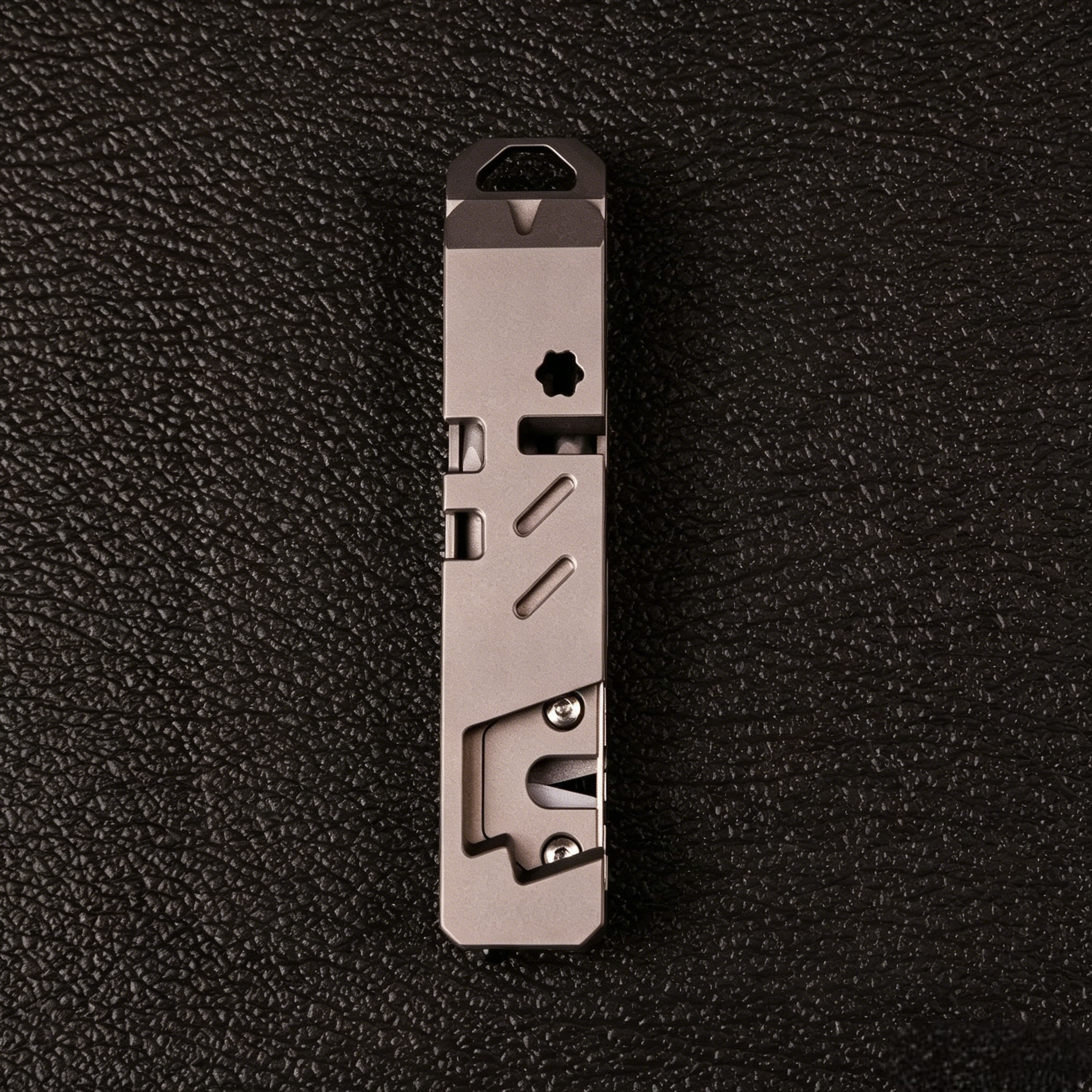 The TriPro Stand: 15-in-1 Titanium EDC Tool and Phone Stand